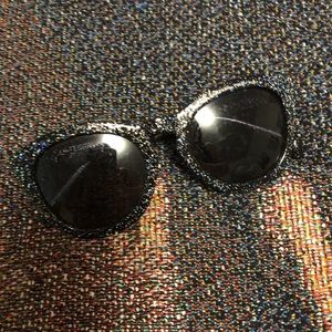Sunglasses with black sparkly frames